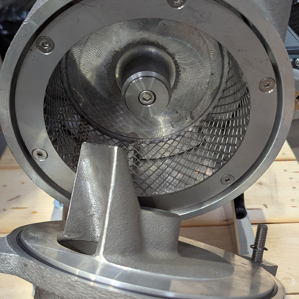 Illustration de "arrivée tangentielle du produit dans le corps du tamis