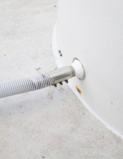 Connexion souple transfert pneumatique en pied de silo composite pesé