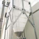 Silo souple et vis souple d'extraction sur site industriel francais