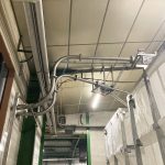 Tuyauterie d'alimentation silo souple en environnement industriel
